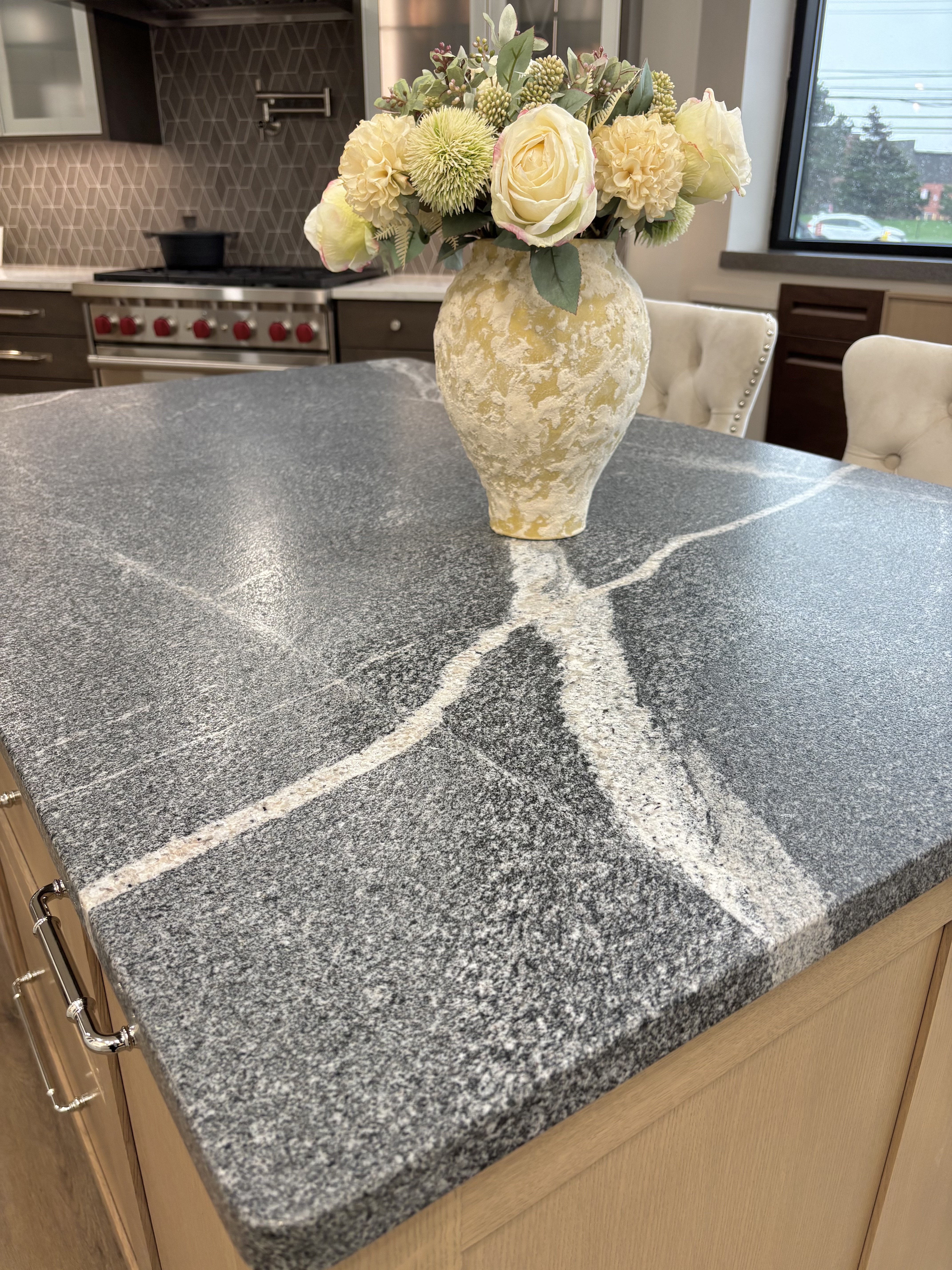 dark granite countertop with white veining
